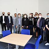 Personen in den Gruppenräumen des Instituts für Mathematik